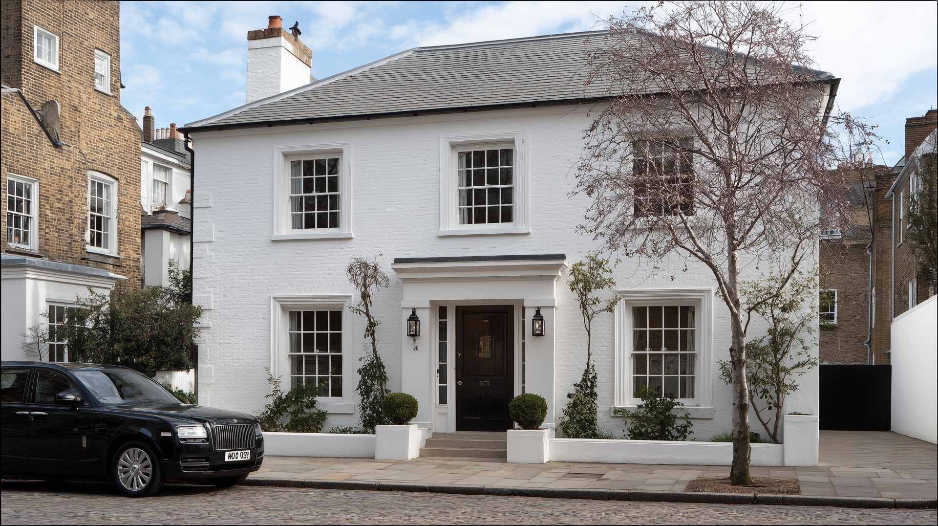 Elegant white house with smooth external wall coatings providing a durable and stylish exterior finish.