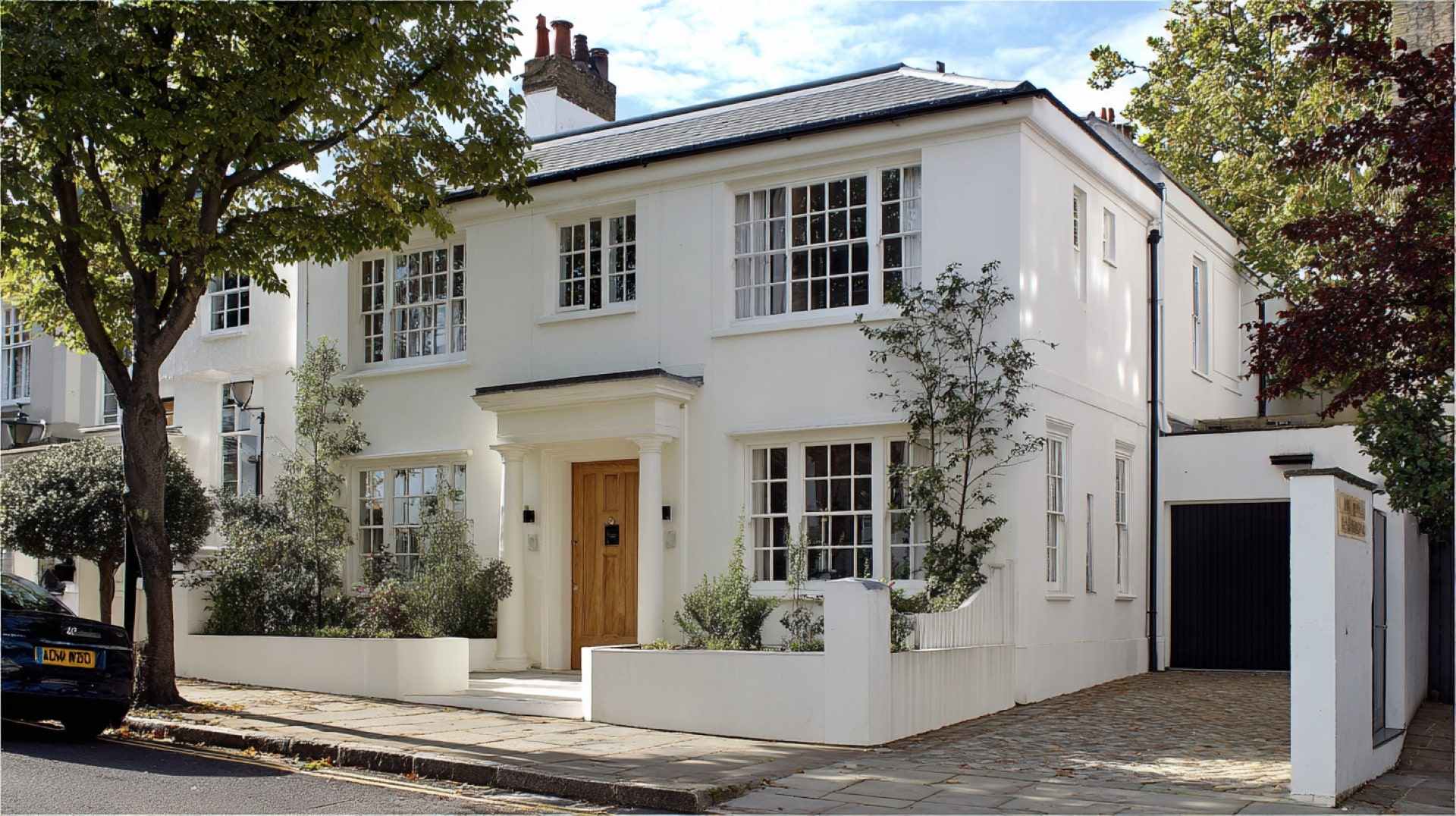 Residential building showing Weather Coating application process for long-lasting exterior protection
